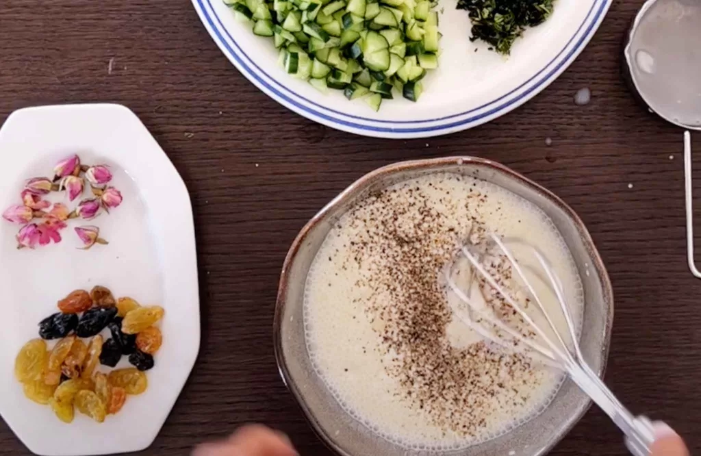 Mixing, yogurt, water and seasoning in a bowl