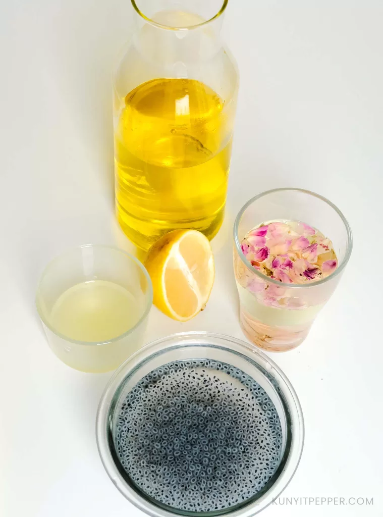 A jar of saffron water, a cup of rose water, small cup of freshly squeezed lemon juice and a bowl of soaked basil seeds