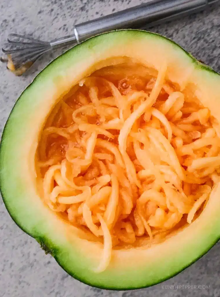 Grated cantaloupe and melon scraper