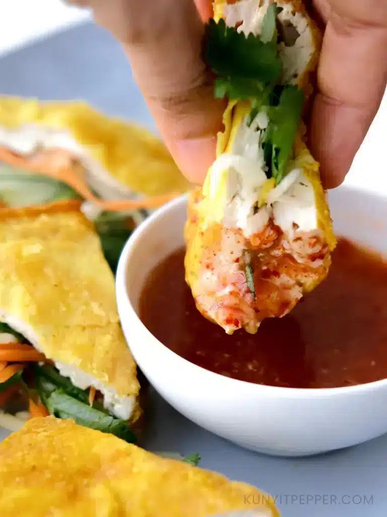 Dipping Vegetarian Stuffed Tofu in Homemade Thai Sauce