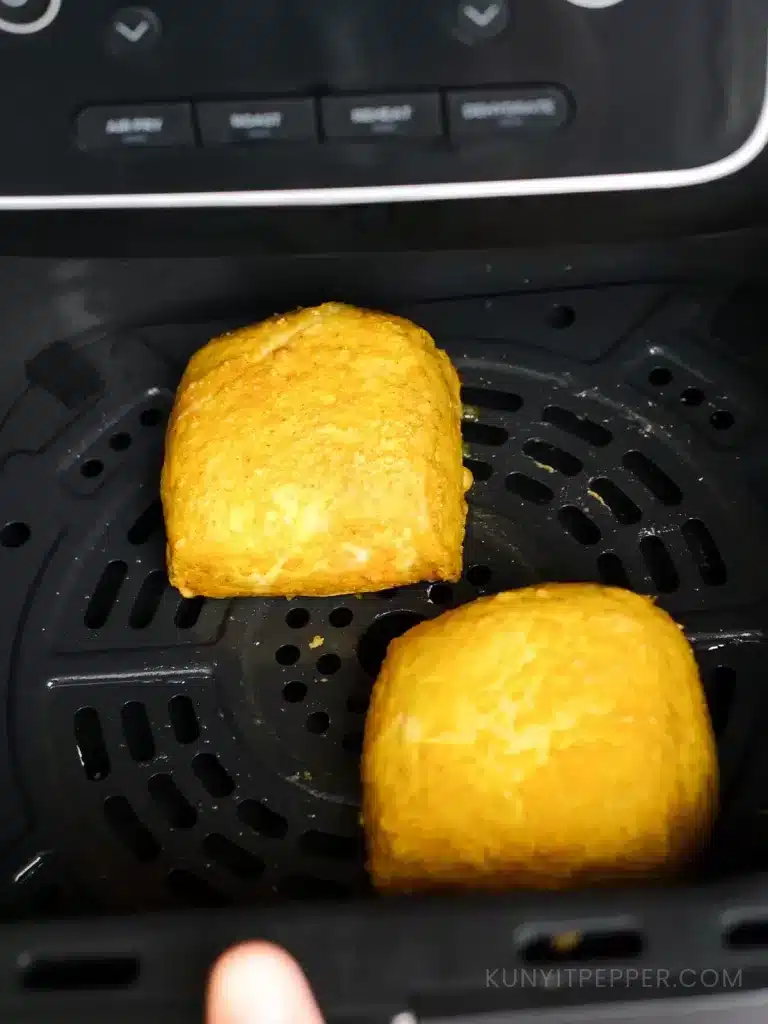 Freshly airfried tofu in air fryer