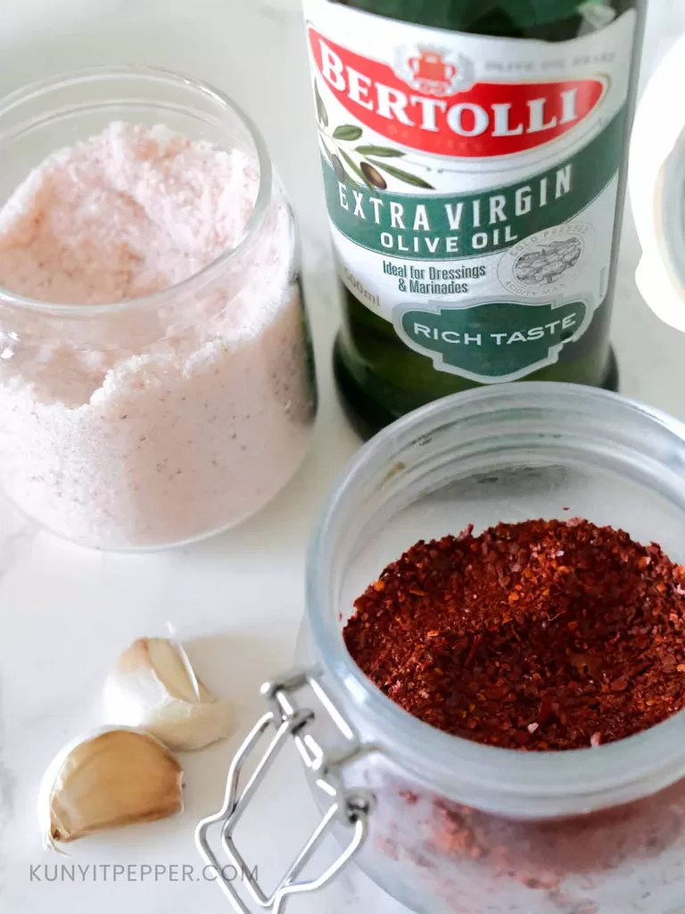 4 ingredients to make chili oil with olive oil , olive oil, chili flakes, salt and garlic