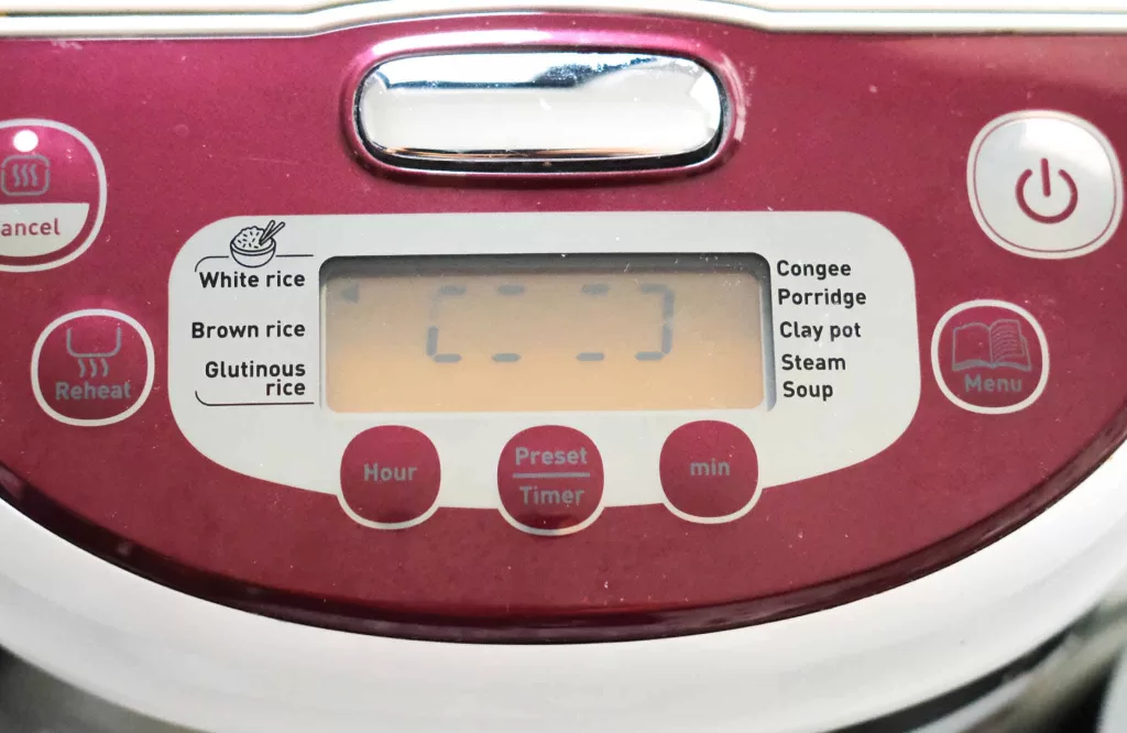 Rice cooker screen with white rice setting On